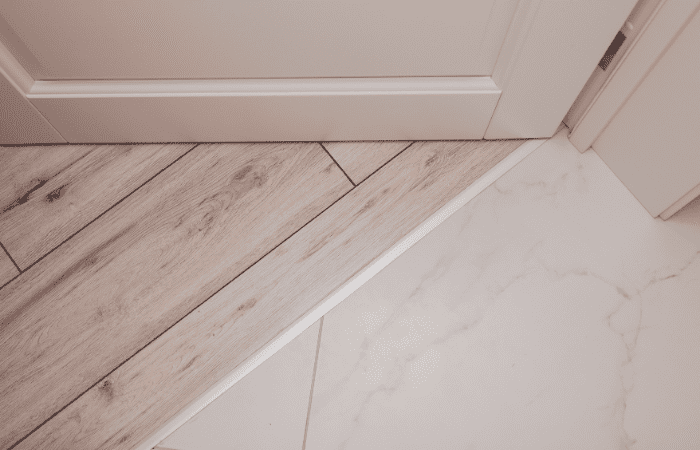 seamless tile to floor transition ideas white wood and white tile transition