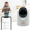 little boy and baby monitor with cell phone app opened on phone