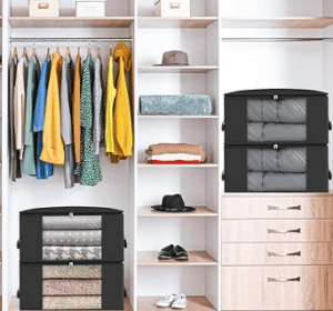 closet with clothes hanging and storage containers on shelves