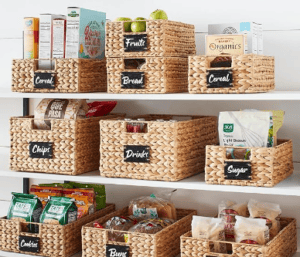 various labeled wicker baskets inside a pantry