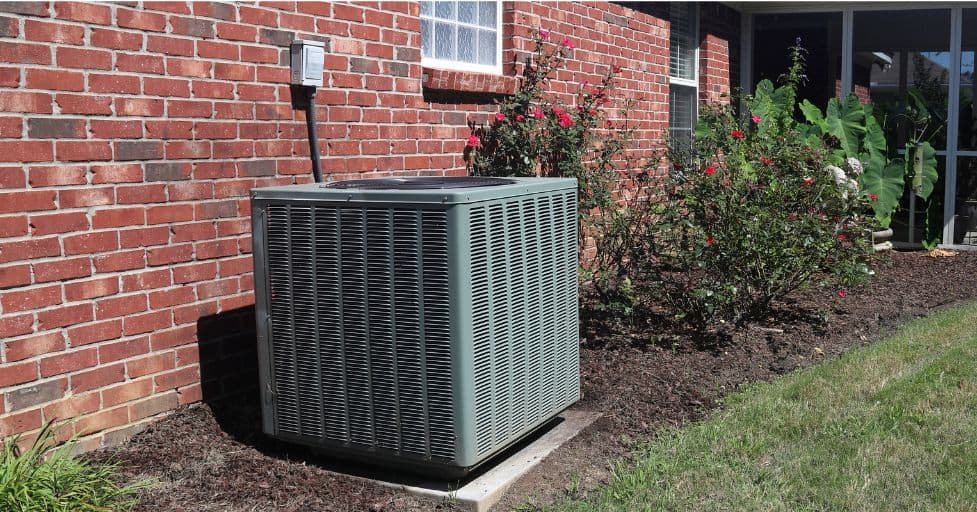 a/c unit at the side of a house