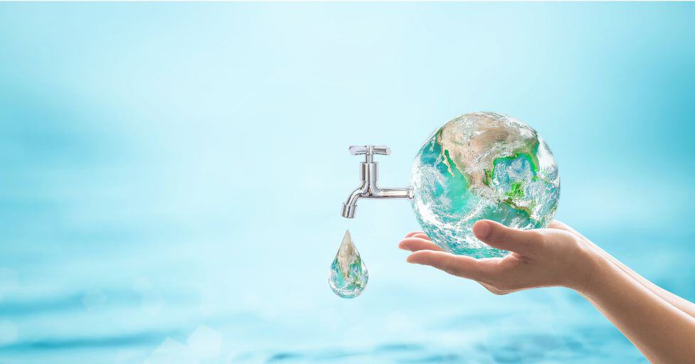 person holding the earth with a water tap sticking out. water conservation for saving money on energy bills