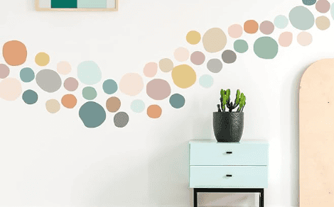 accent wall peel and stick wallpaper polka dot pattern on a wall